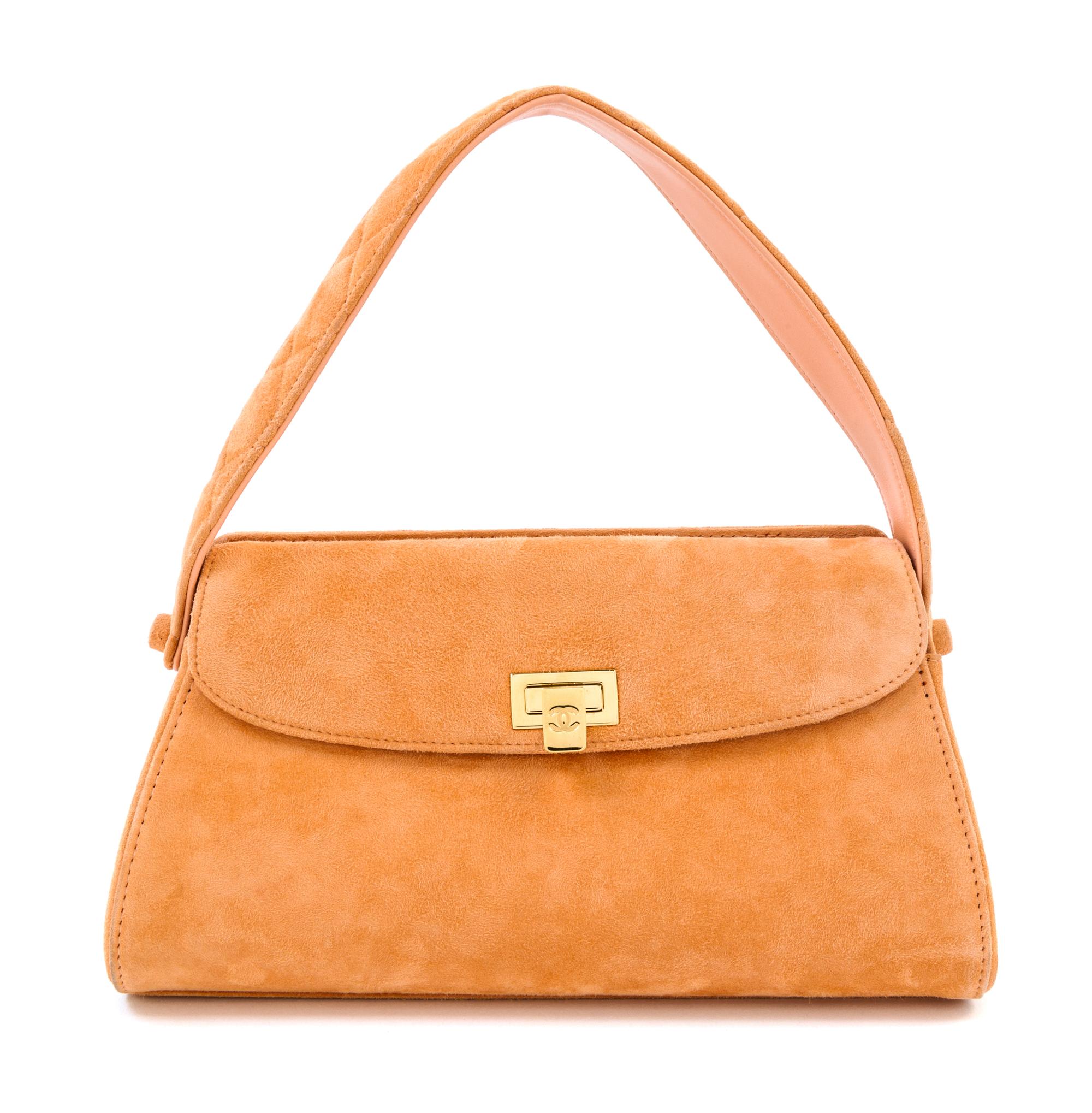 A Chanel Peach Suede Handbag, 10.5" x 6" x 4"; Handle drop: 4.75".