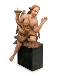 An Italian Carved and Polychrome Figural Torchère