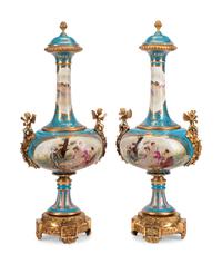 A Pair of Gilt Bronze Mounted Sèvres Style Porcelain Vases and Covers