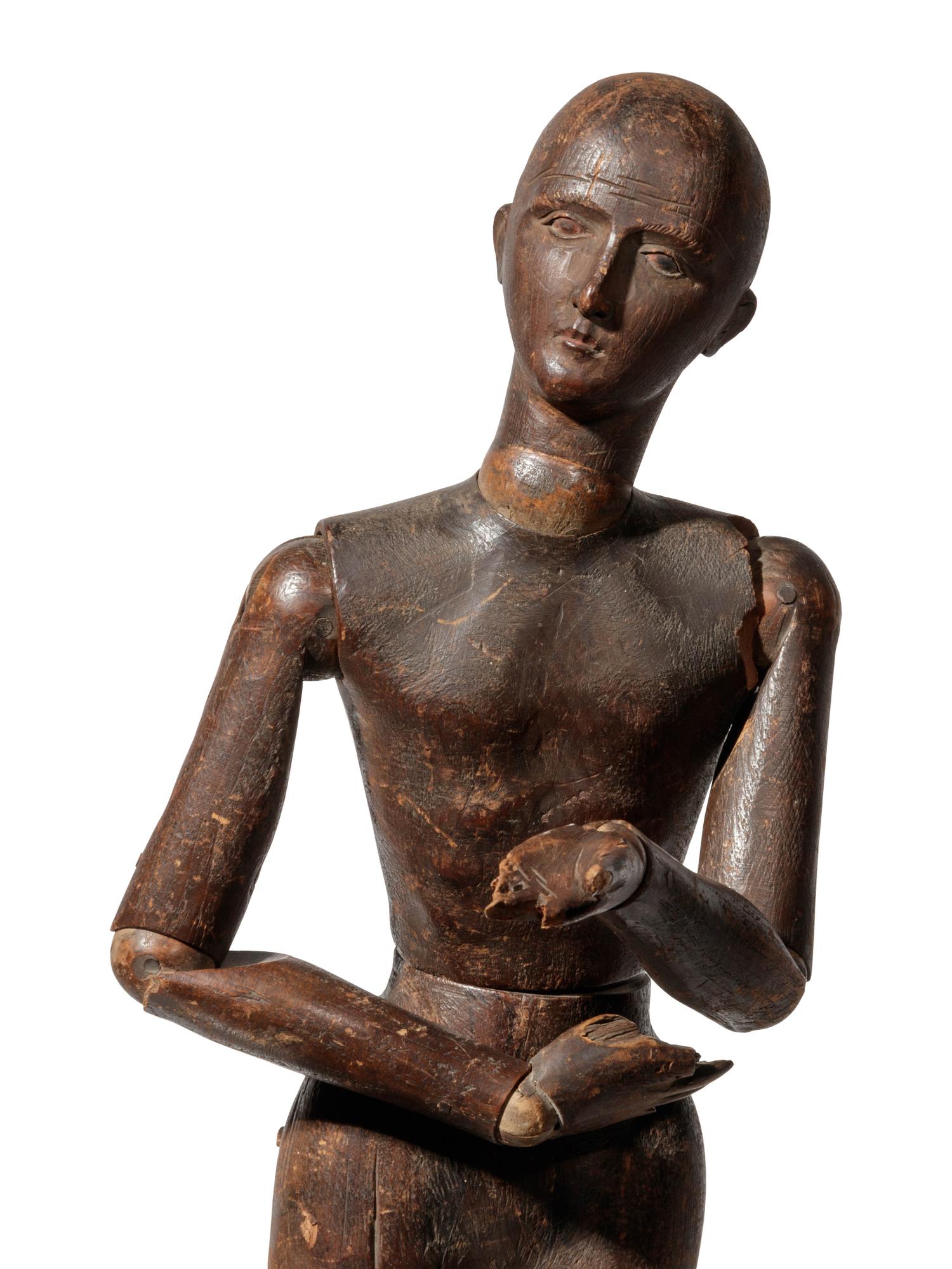 A Continental Carved Pine Articulated Model