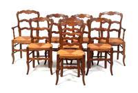A Set of Eight Ladderback Dining Chairs Height 38 1/4 inches.