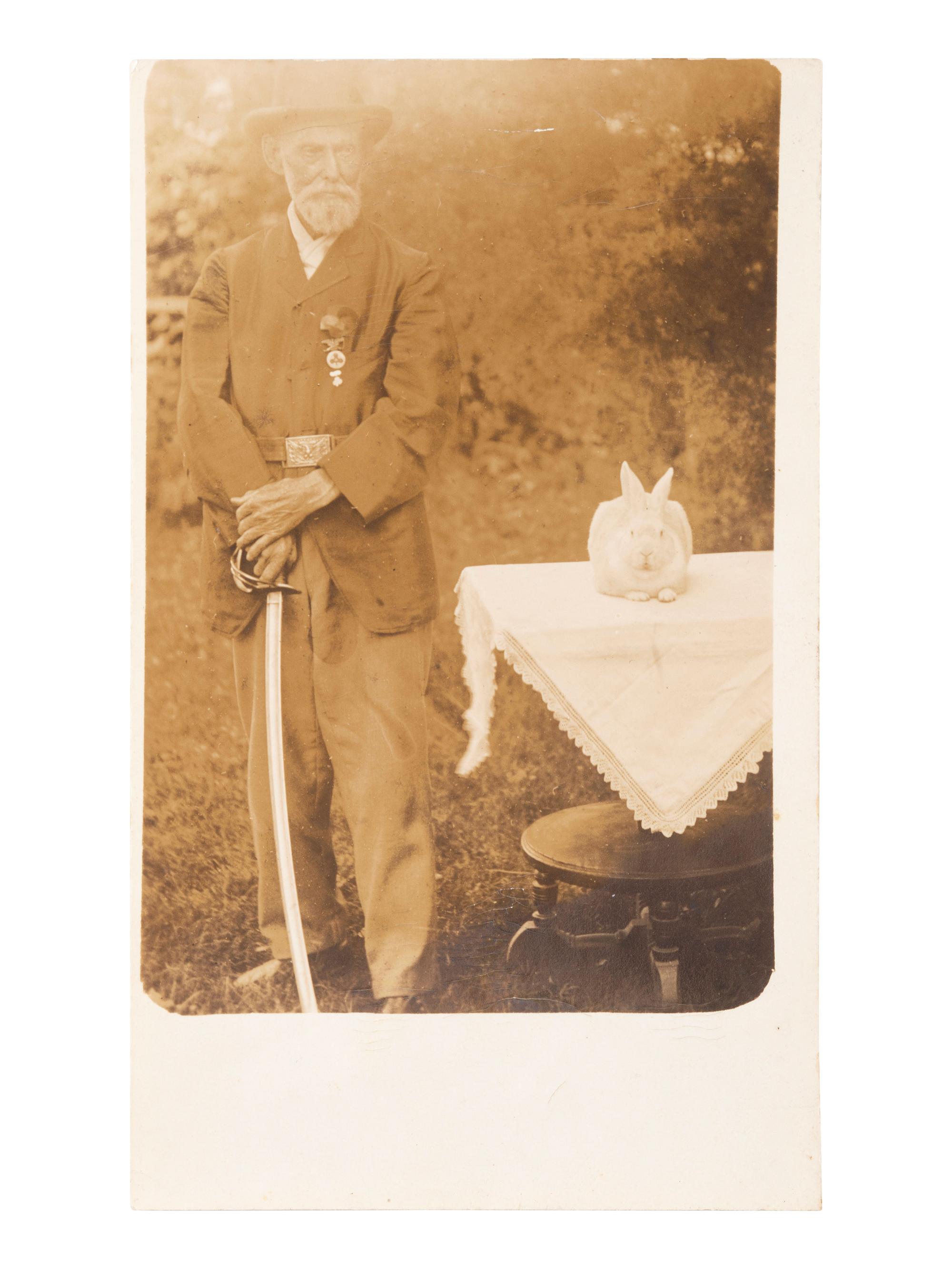 [CIVIL WAR]. Photograph of a GAR veteran posed with a large rabbit. Ex Julian Converse Collection.
