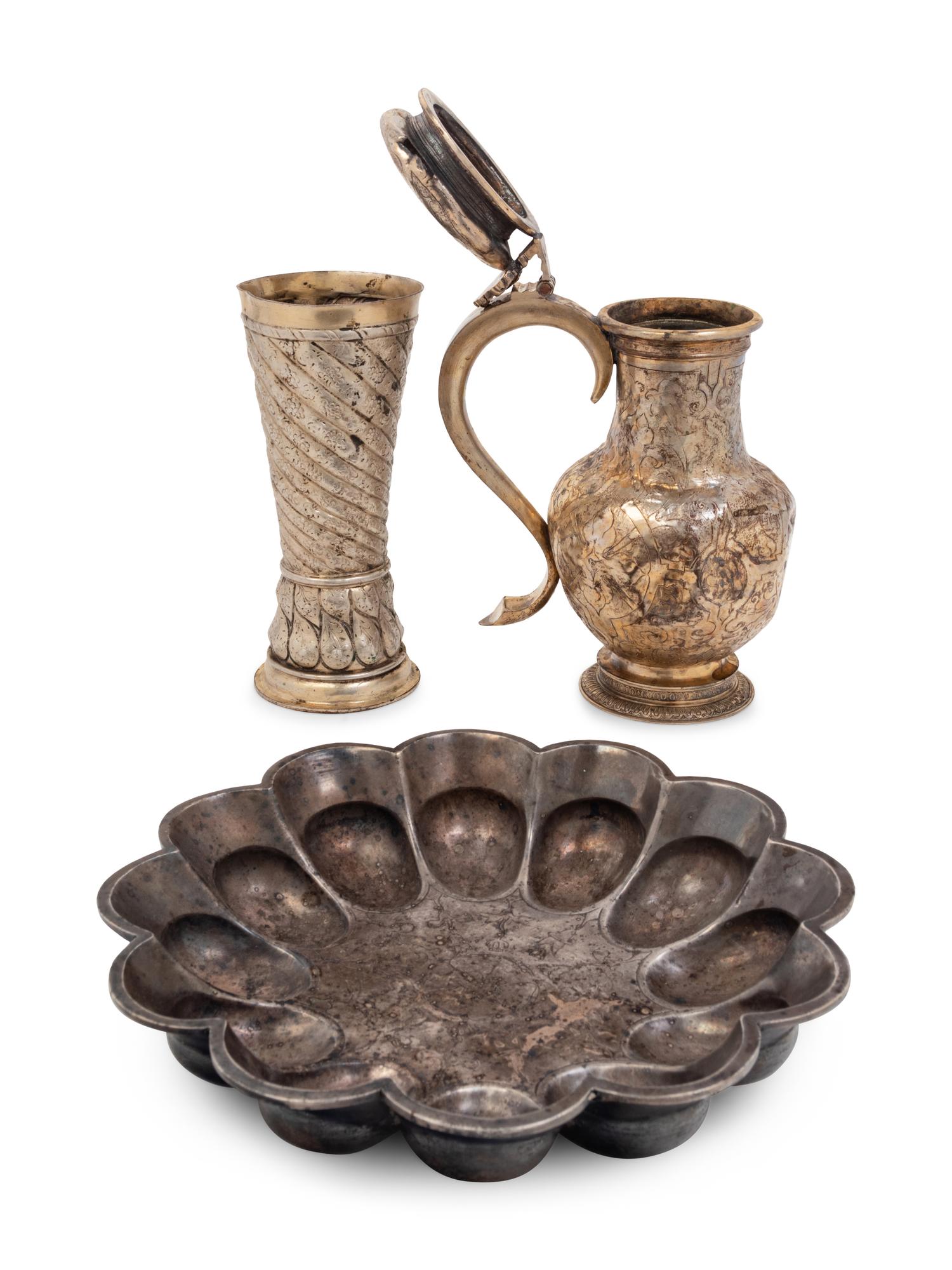 A Continental Silvered Metal Beaker, Covered Vessel and a Lobed Bowl