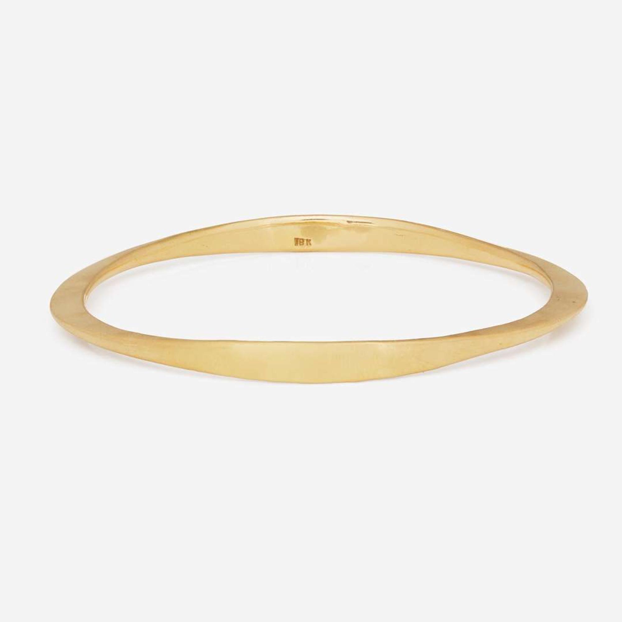 An 18K Yellow Gold Bangle Bracelet