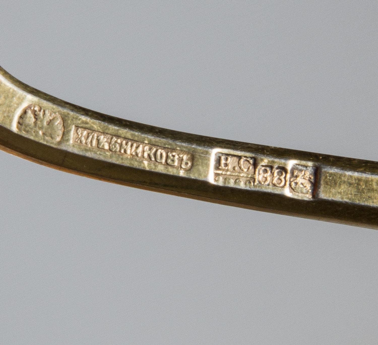 A Russian Silver-Gilt and Enamel Spoon, Mark of Ivan Khlebnikov with Imperial warrant, assay mark of Viktor Savinsky, Moscow, 19th cent