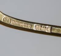 A Russian Silver-Gilt and Enamel Spoon, Mark of Ivan Khlebnikov with Imperial warrant, assay mark of Viktor Savinsky, Moscow, 19th cent