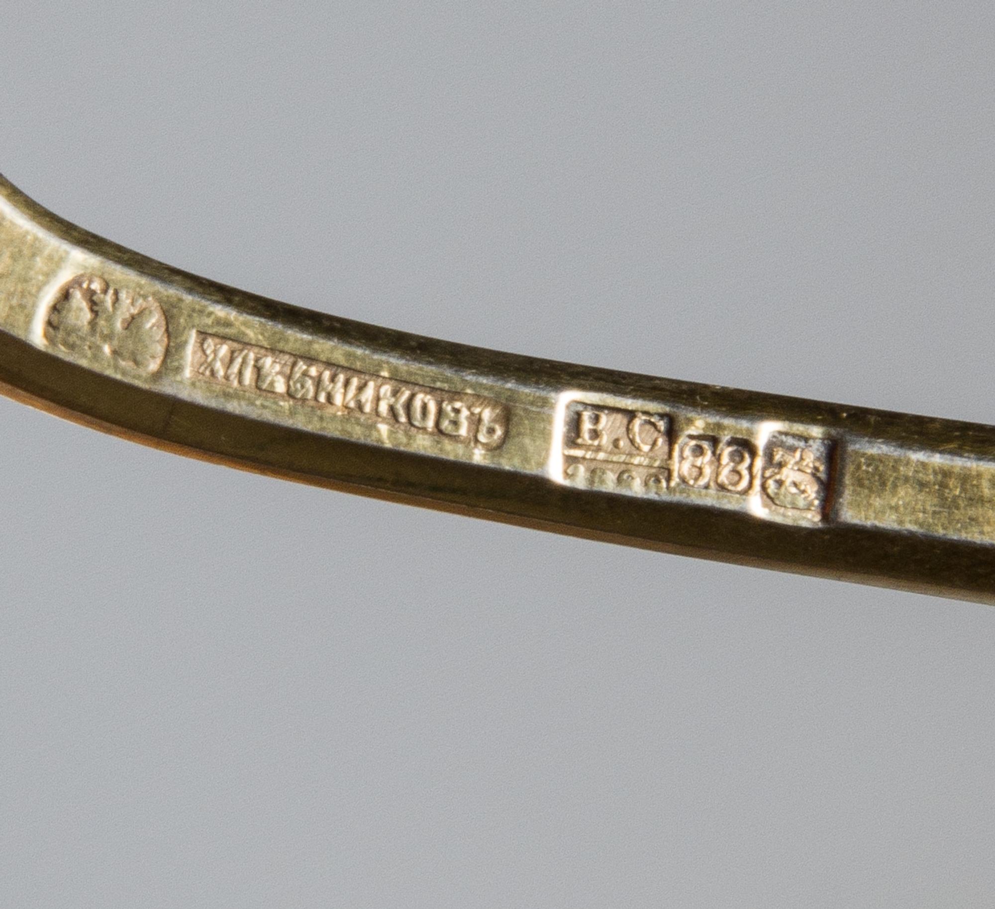 A Russian Silver-Gilt and Enamel Spoon, Mark of Ivan Khlebnikov with Imperial warrant, assay mark of Viktor Savinsky, Moscow, 19th cent