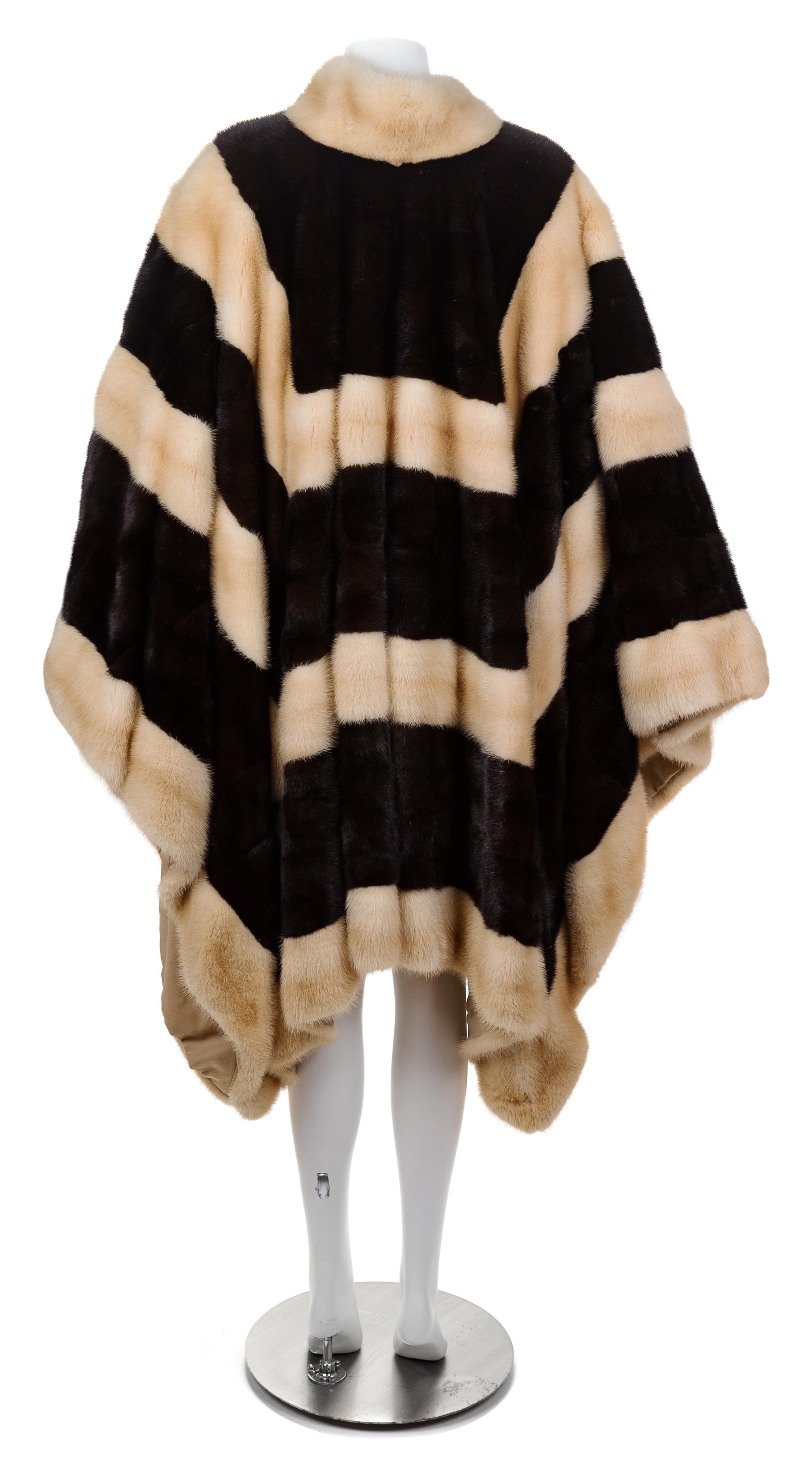 A Bergdorf Goodman Black and White Mink Horizontal Striped Cape, No size.