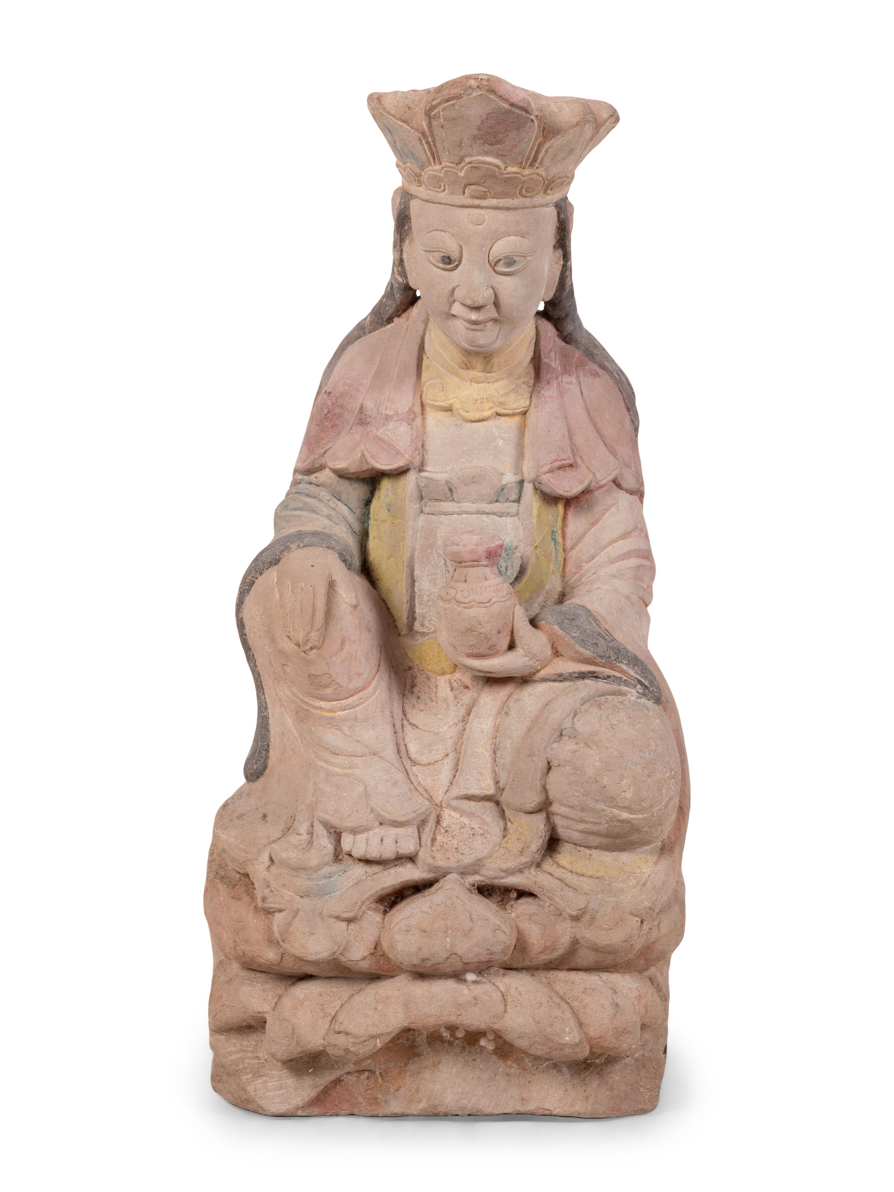 A Chinese Carved Stone Seated Figure with Polychrome Decoration