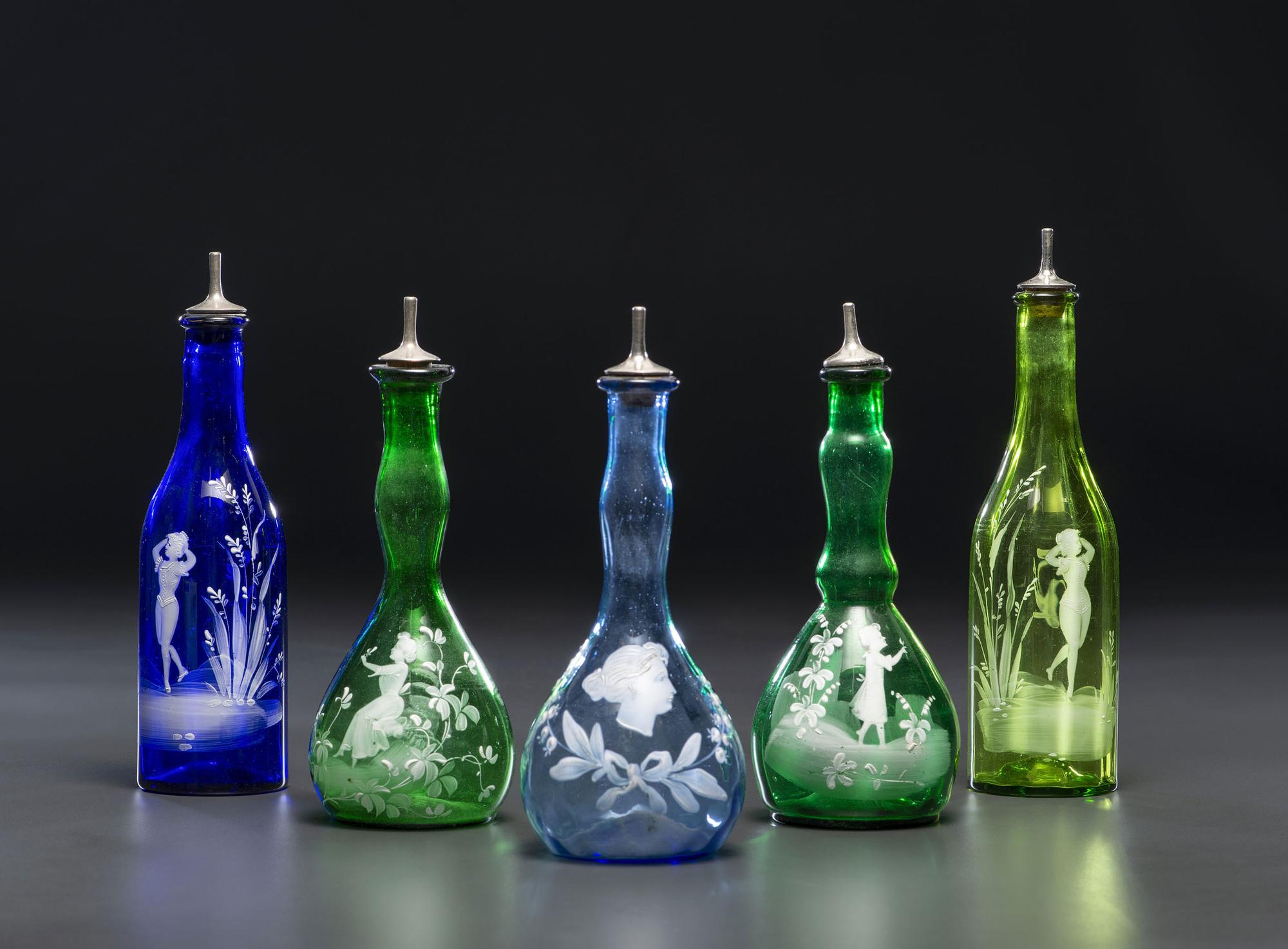 Five Green and Cobalt 'Mary Gregory' Glass Barber Bottles