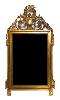 An Italian Giltwood Mirror, Height 34 1/2 x width 21 1/2 inches.