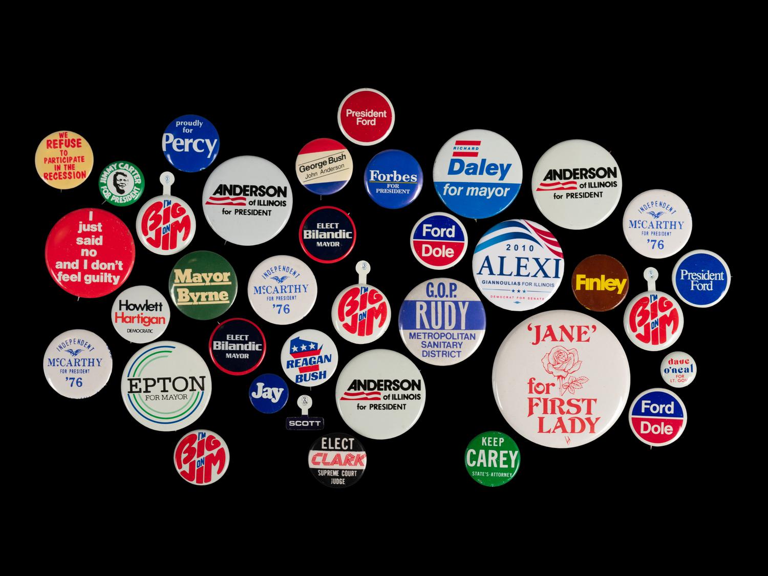 (Politics) A group of approximately 34 political campaign buttons the second half of the 20th century.