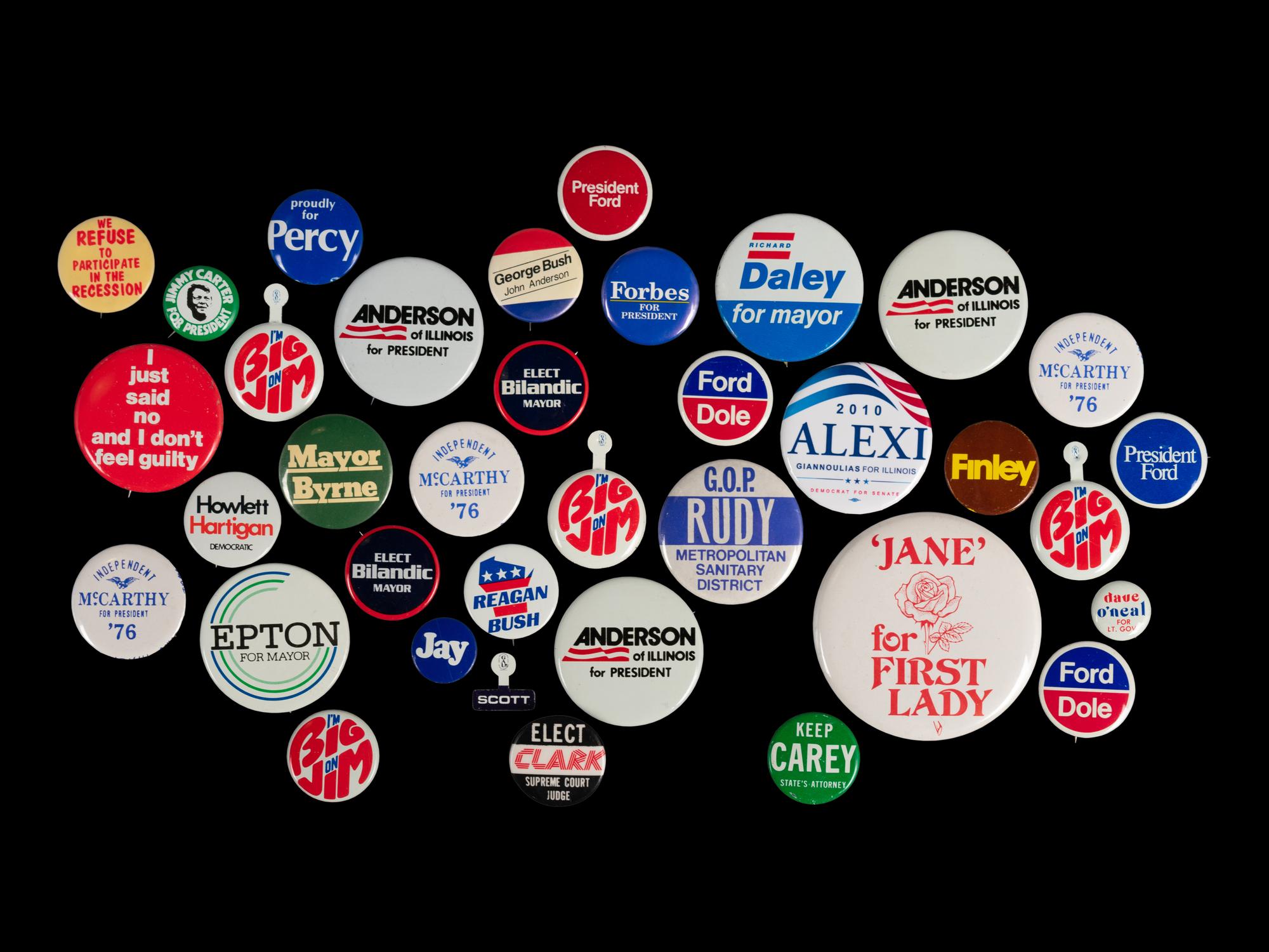 (Politics) A group of approximately 34 political campaign buttons the second half of the 20th century.