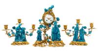 A French Gilt Bronze and Chinese Porcelain Clock Garniture Height of clock 15 inches. — MOVEMENT BY SAMUEL MARTI, CIRCA 1900