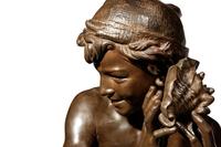 Jean-Baptiste Carpeaux (French, 1827-1875) | 19th Century | Le jeune pêcheur à la coquille | bronze | signed JB Carpeaux and with Propriété Carpeaux stamp | Height 35 1/2 x width 15 5/8 x depth 18 5/8 inches.