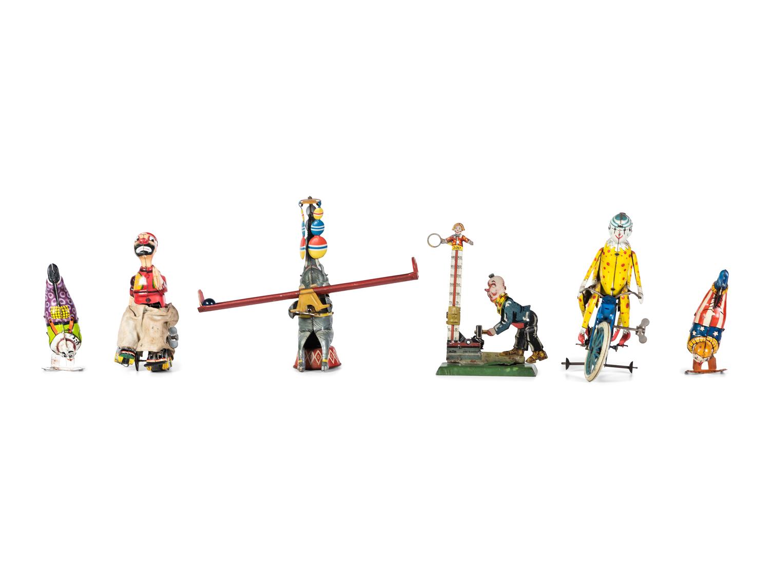 Six Tin Clown and Circus Toys