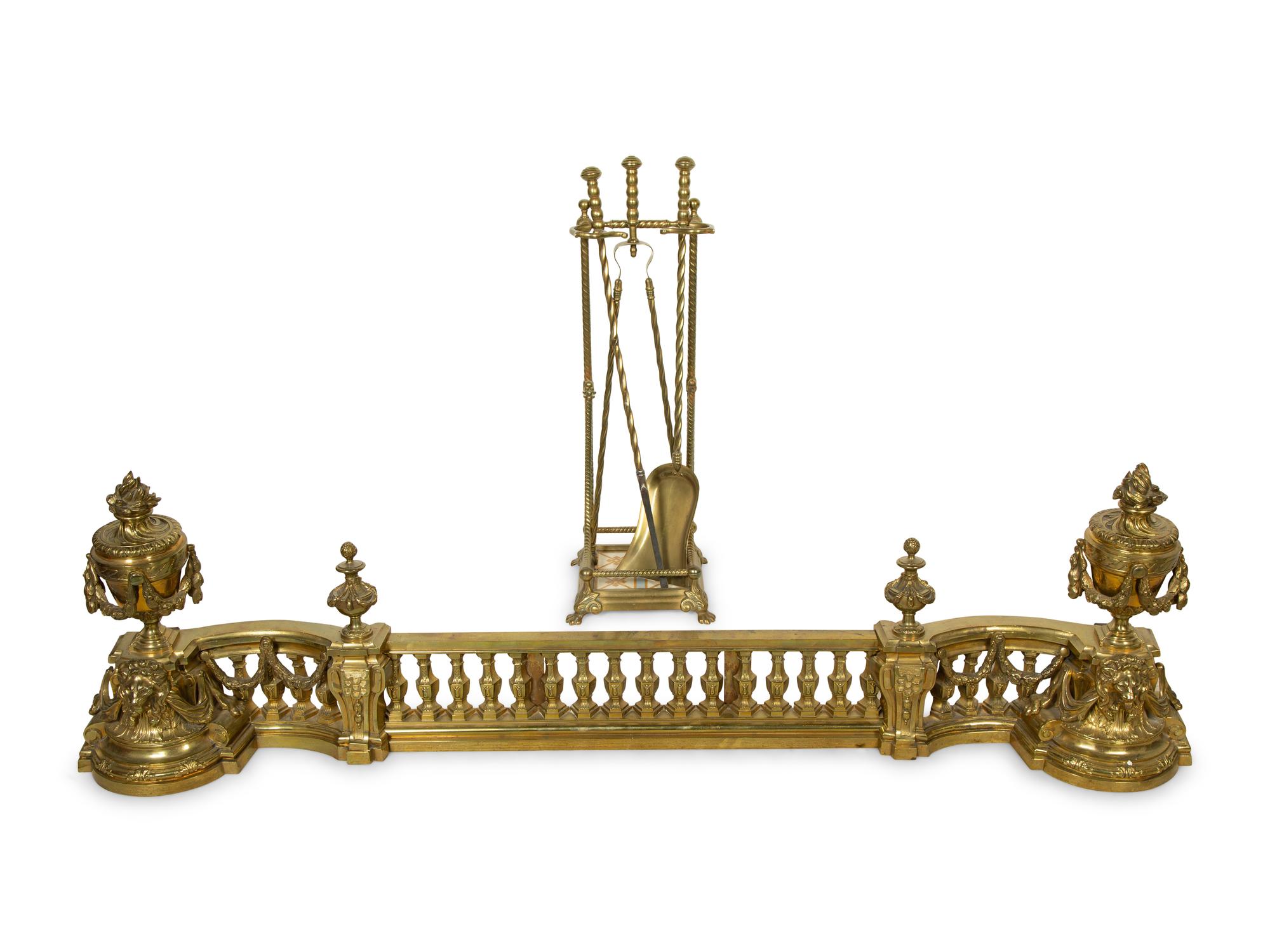 A Neoclassical Brass Fire Fender with a Set of Tools