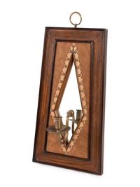 A Pair of Brass Mounted Suede-Inset Oak Mirrored Sconces