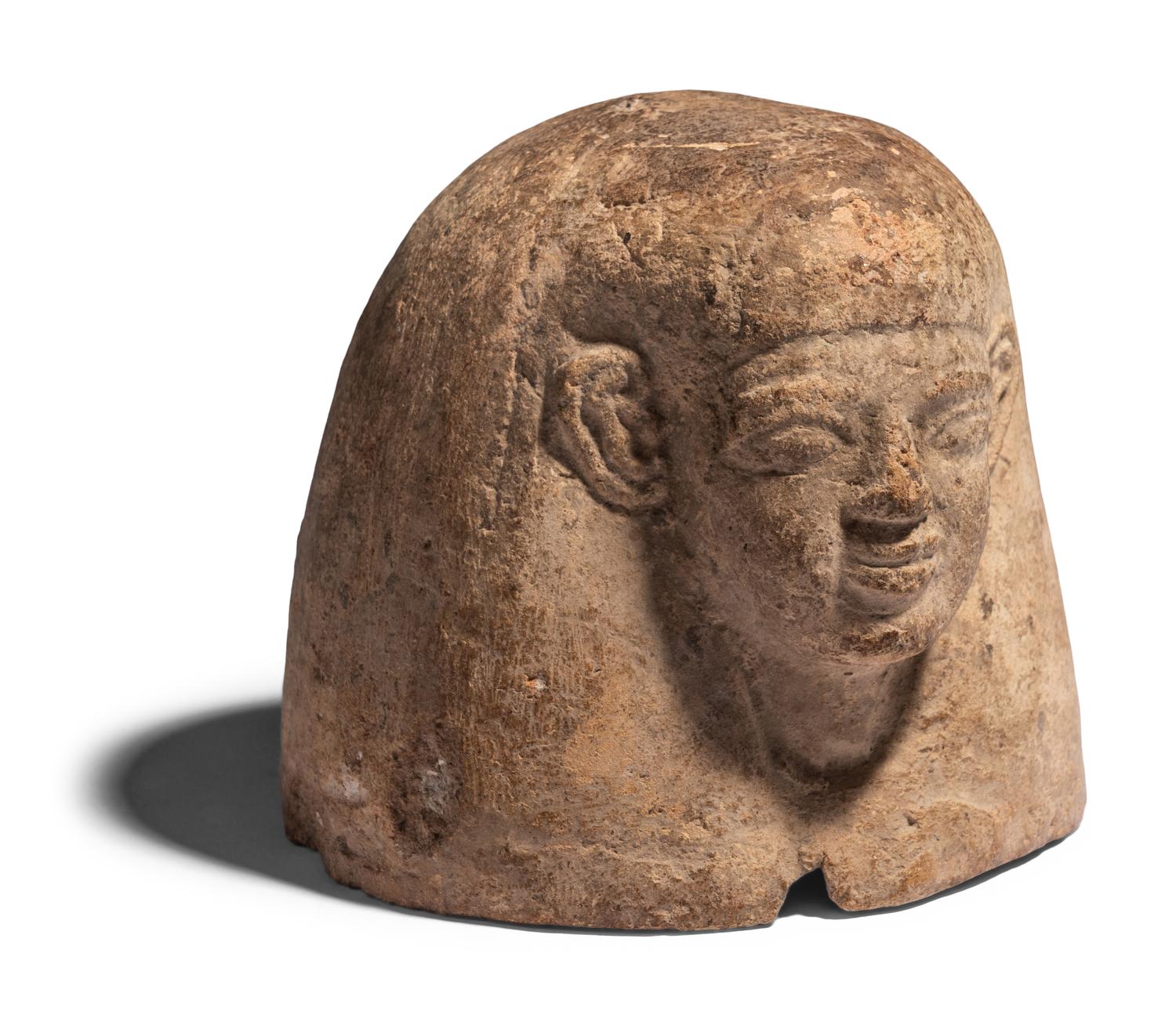 An Egyptian Plaster Canopic Jar Lid of Amset