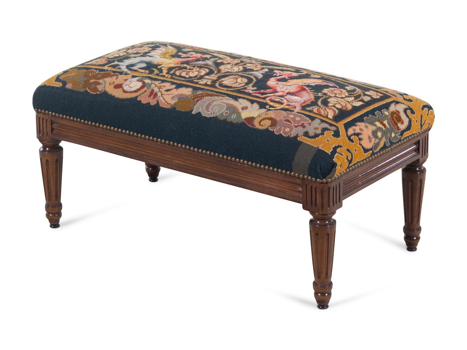 A Louis XVI Style Walnut Bench with a Needlepoint Seat