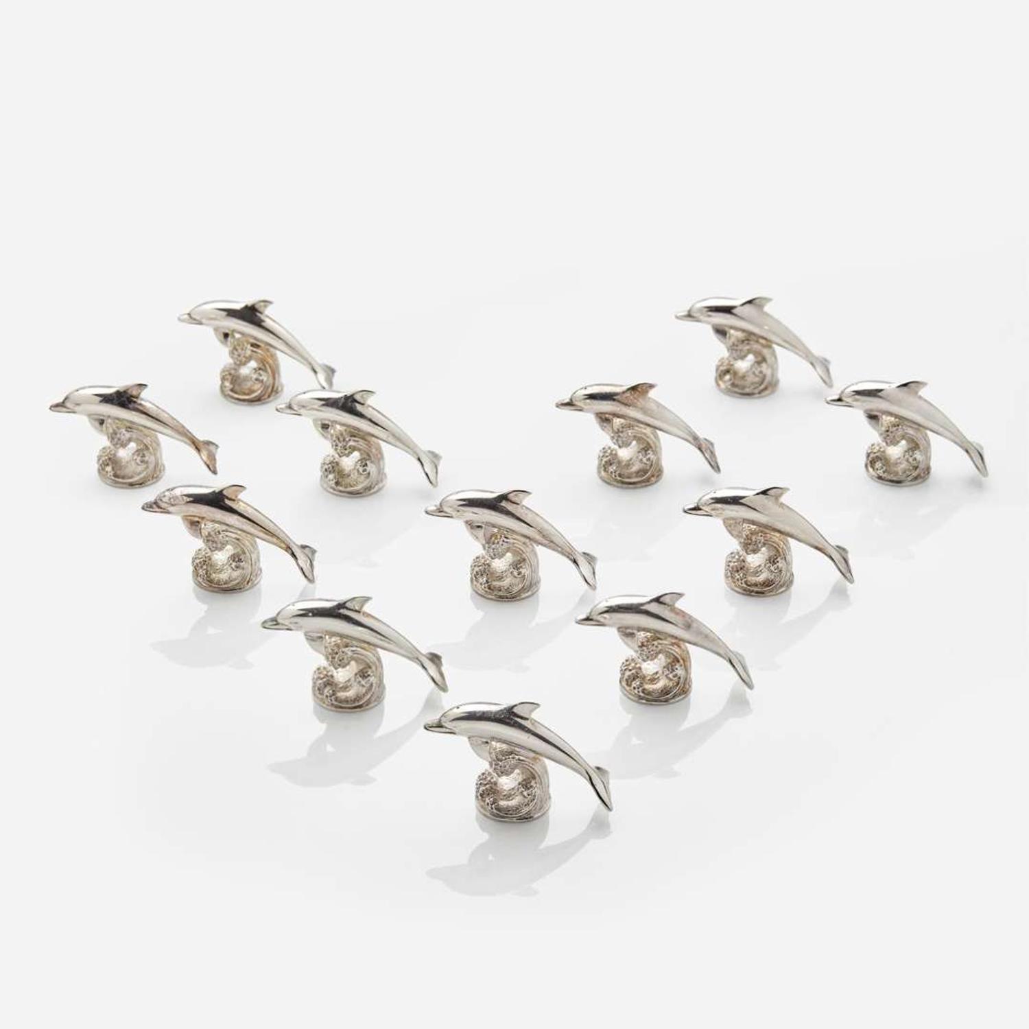 Garrard & Co. Ltd. (English, active 1722-Present) Set of Twelve Sterling Silver Dolphin-Form Place Card Holders, UK, 1995