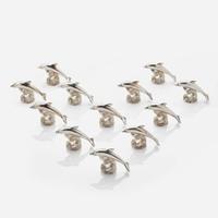 Garrard & Co. Ltd. (English, active 1722-Present) Set of Twelve Sterling Silver Dolphin-Form Place Card Holders, UK, 1995