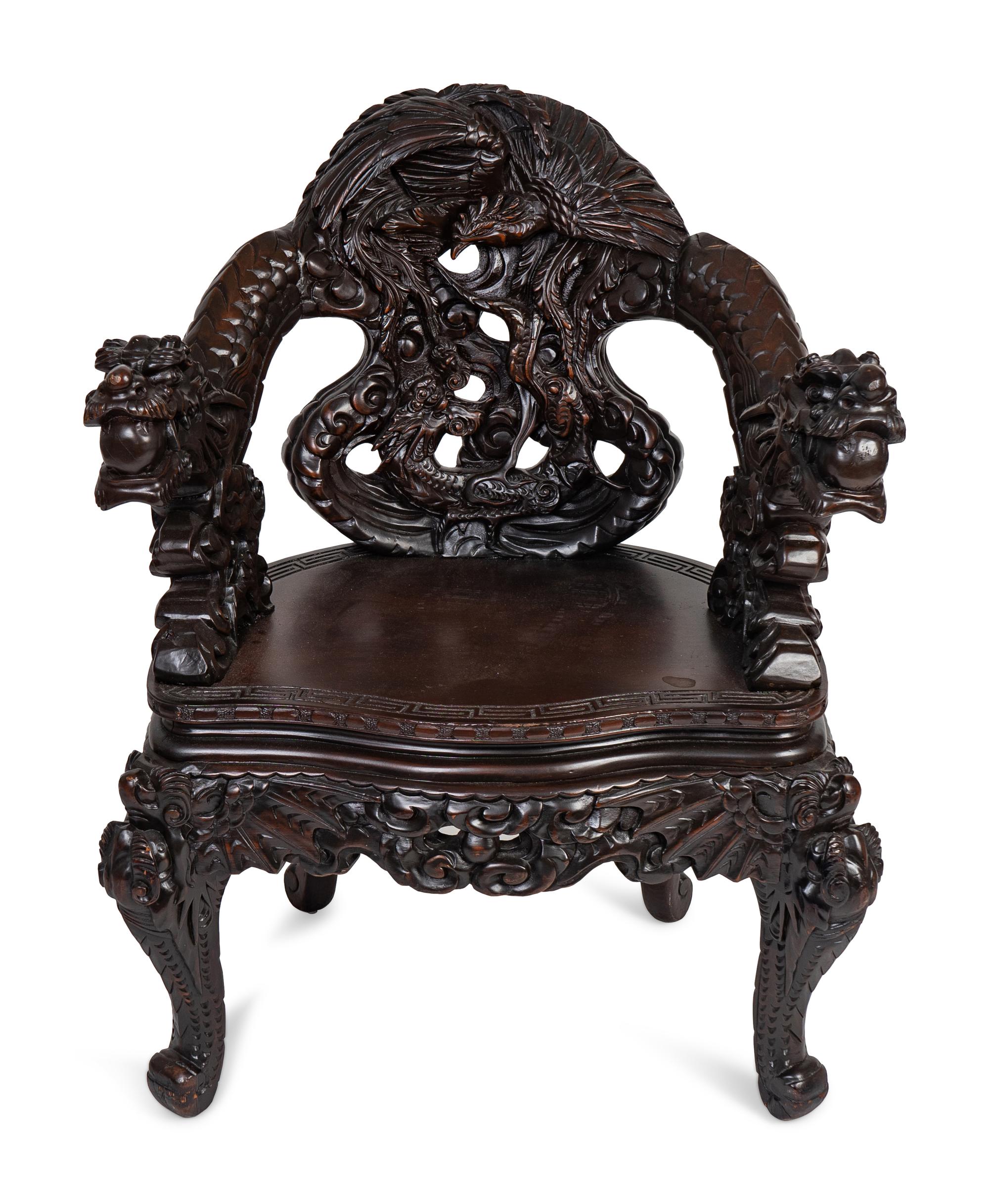 A Japanese Carved Hardwood Armchair