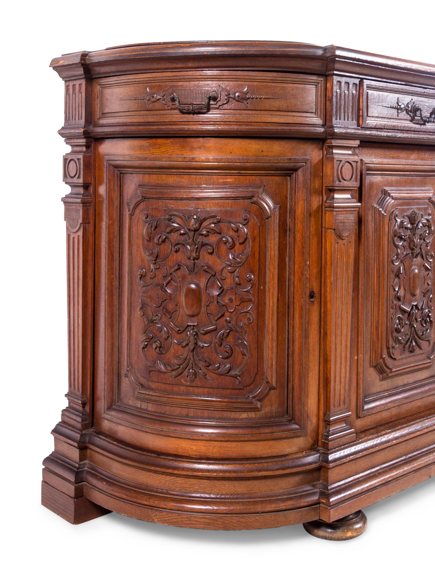 A Renaissance Revival Carved Oak Buffet