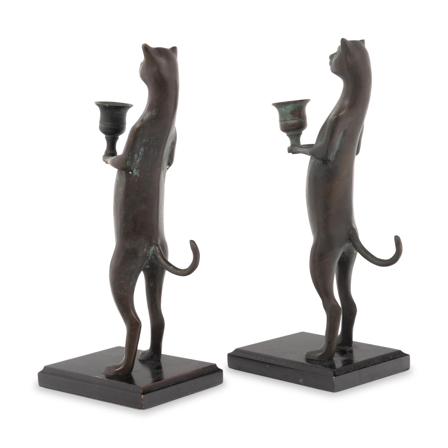 A Pair of Pewter Cat-Form Candlesticks