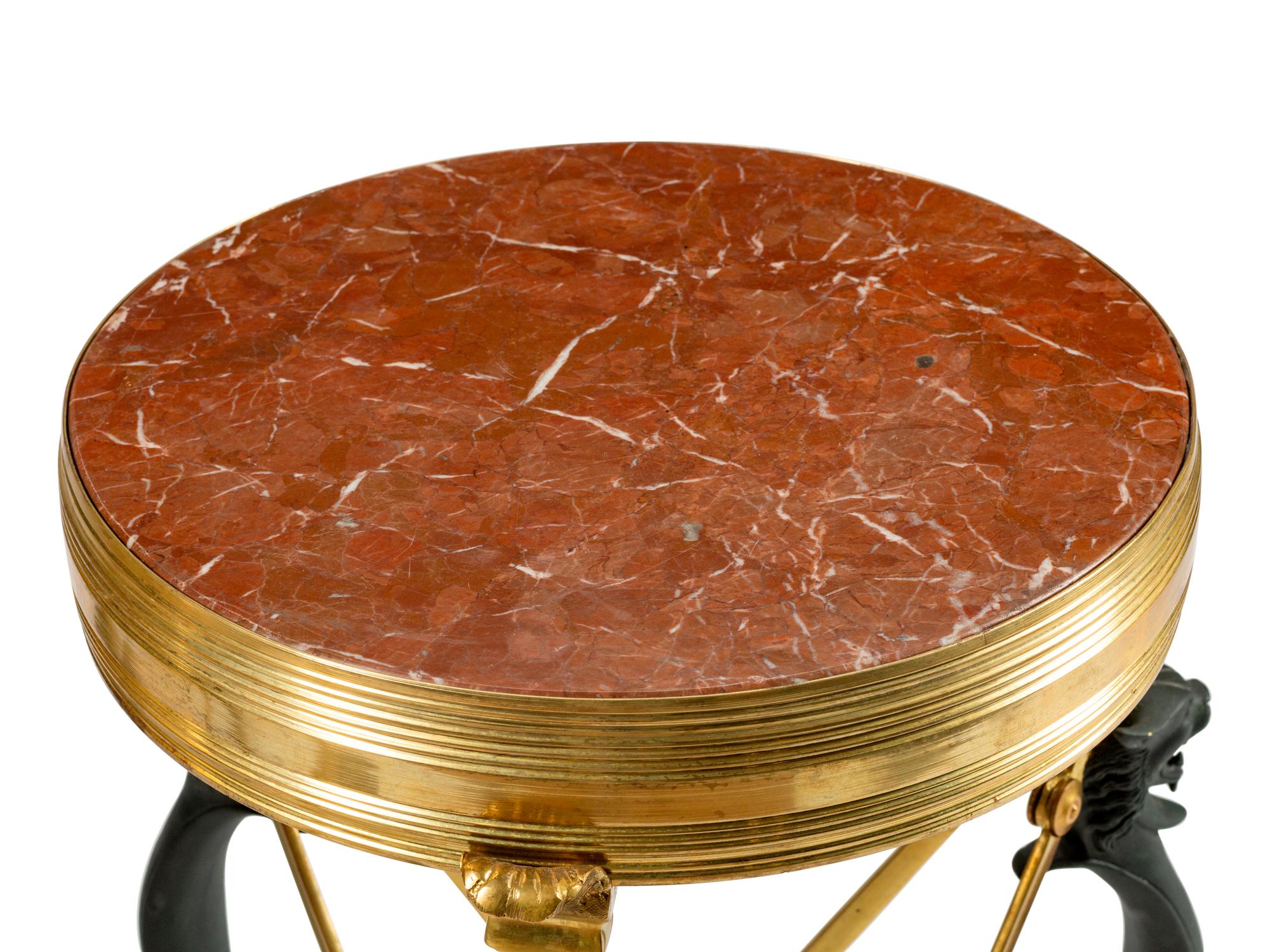 A Pair of Neoclassical Style Parcel-Gilt and Patinated Bronze Guéridons