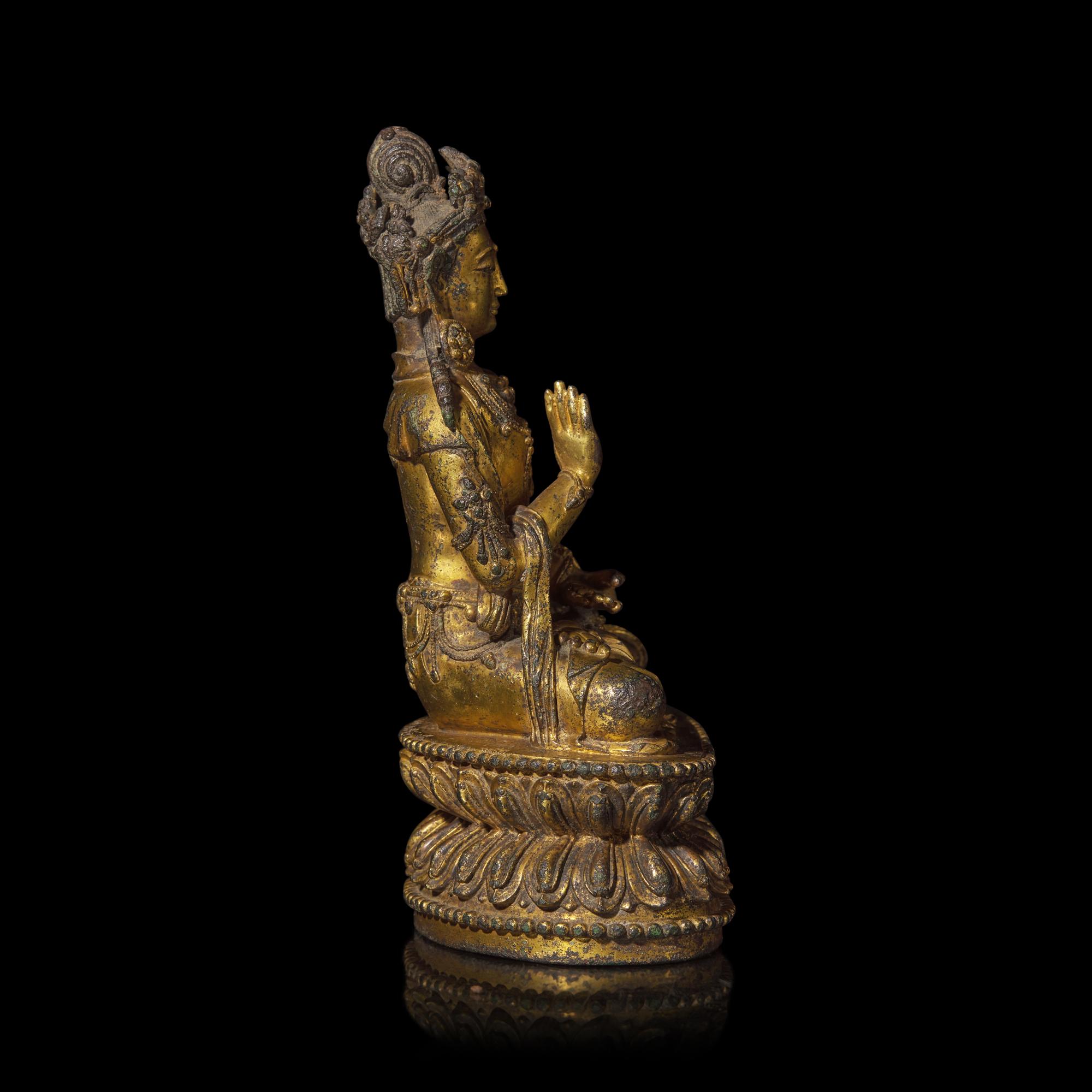 A Chinese Gilt Bronze Figure of a Seated Bodhisattva, Ming Dynasty, 15th Century 明 銅鎏金菩薩坐像