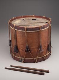 [MILITARIA]. Possibly Mexican War painted drum featuring ornate tack design, with drumsticks.