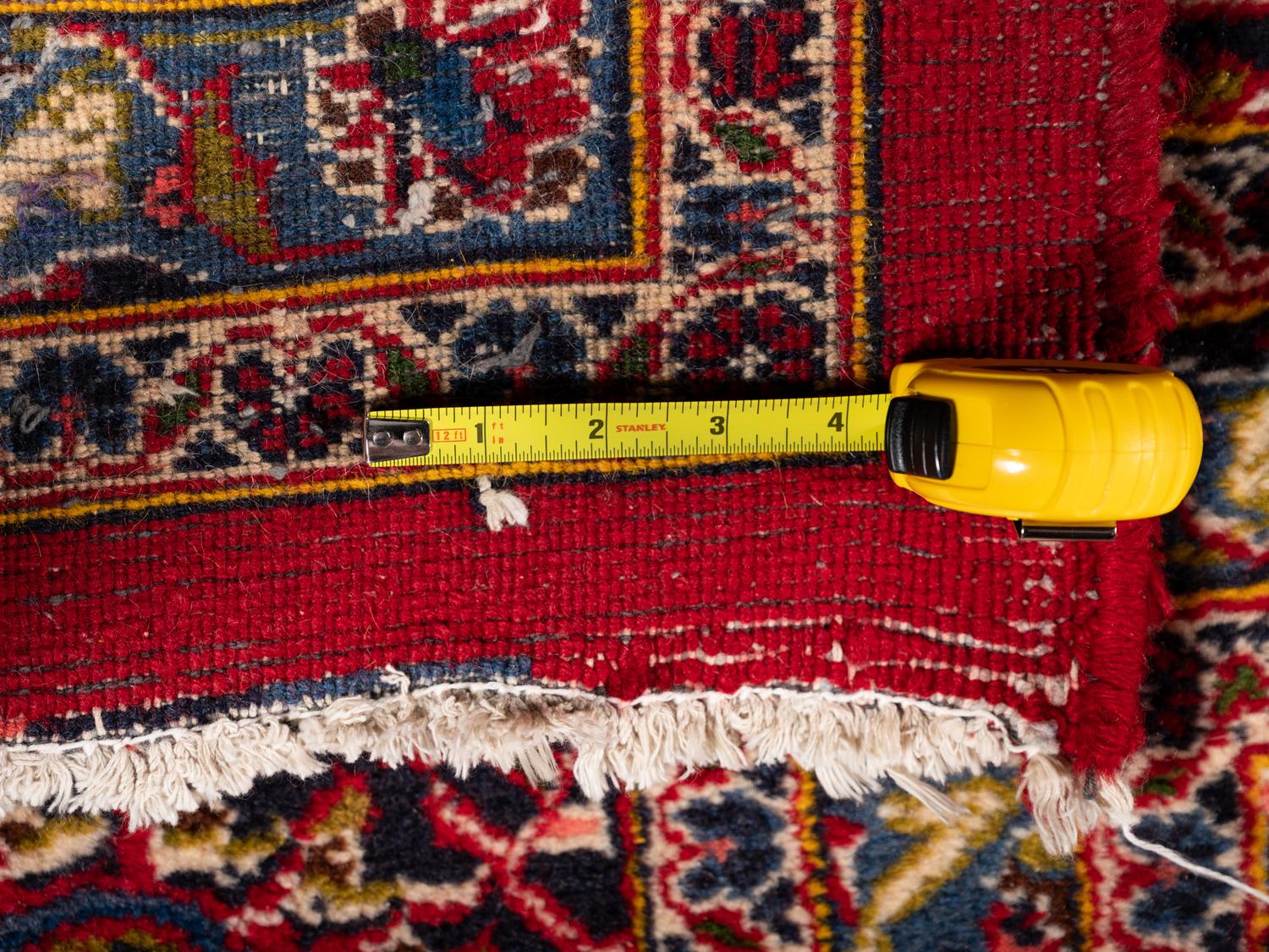 A Kashan Wool Rug