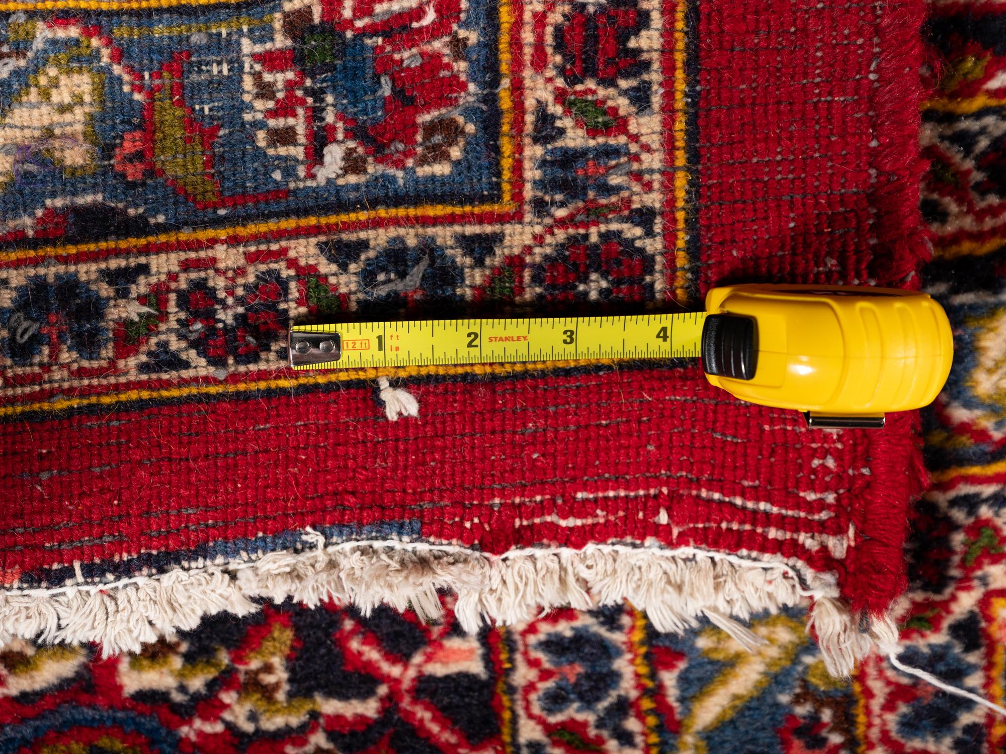 A Kashan Wool Rug