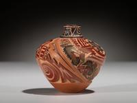 Carved Polychrome Pottery Vase