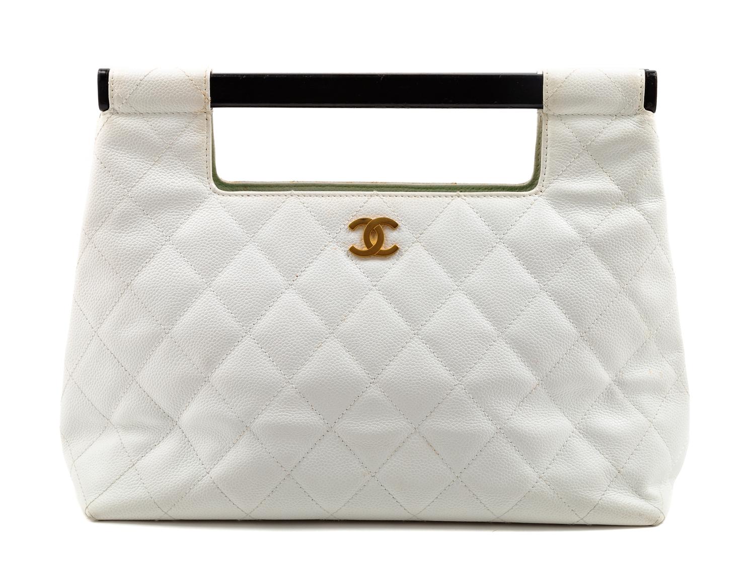 A Chanel White Caviar Quilted Melrose Cabas Wood Handle Bag, 10.5" H x 13.5" W x 4.5" D; Handle drop: 2".