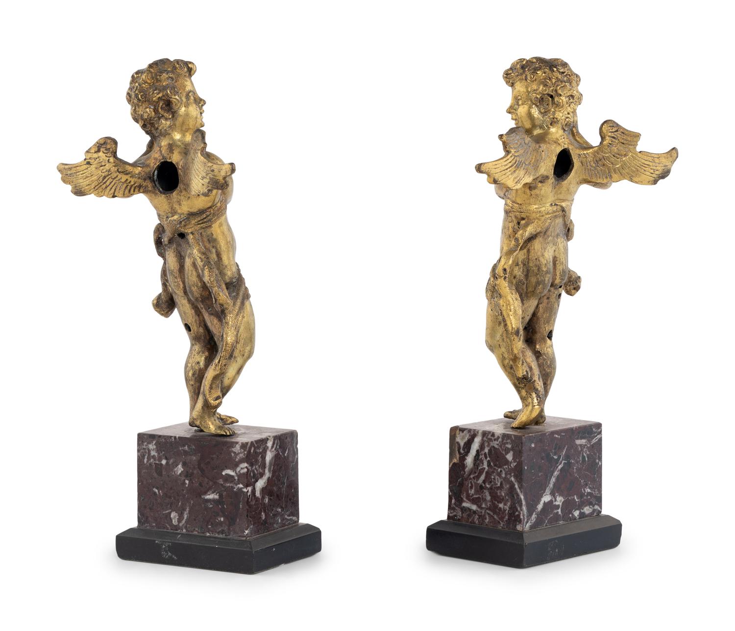 A Pair of Continental Gilt Bronze Figures of Putti