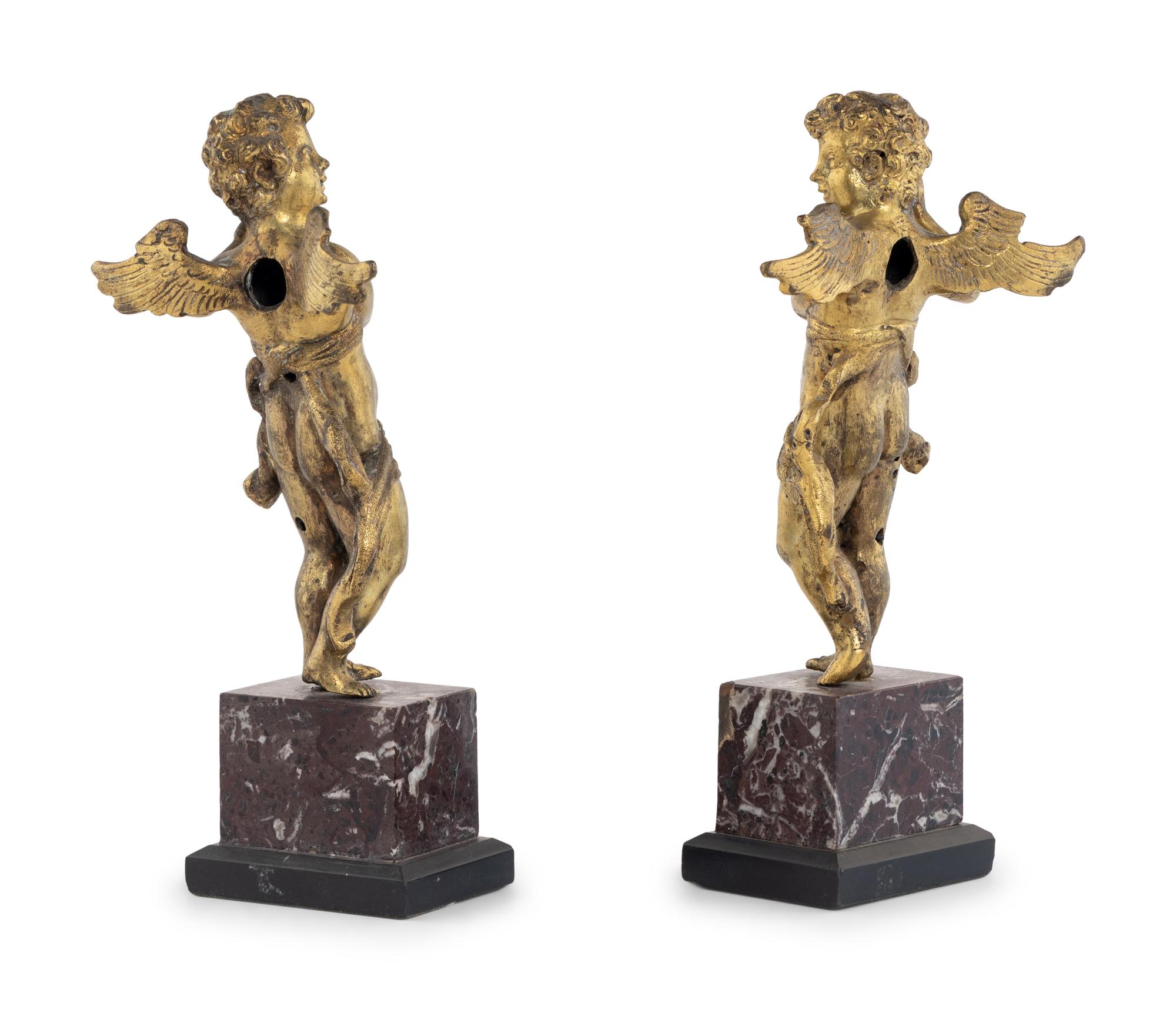 A Pair of Continental Gilt Bronze Figures of Putti