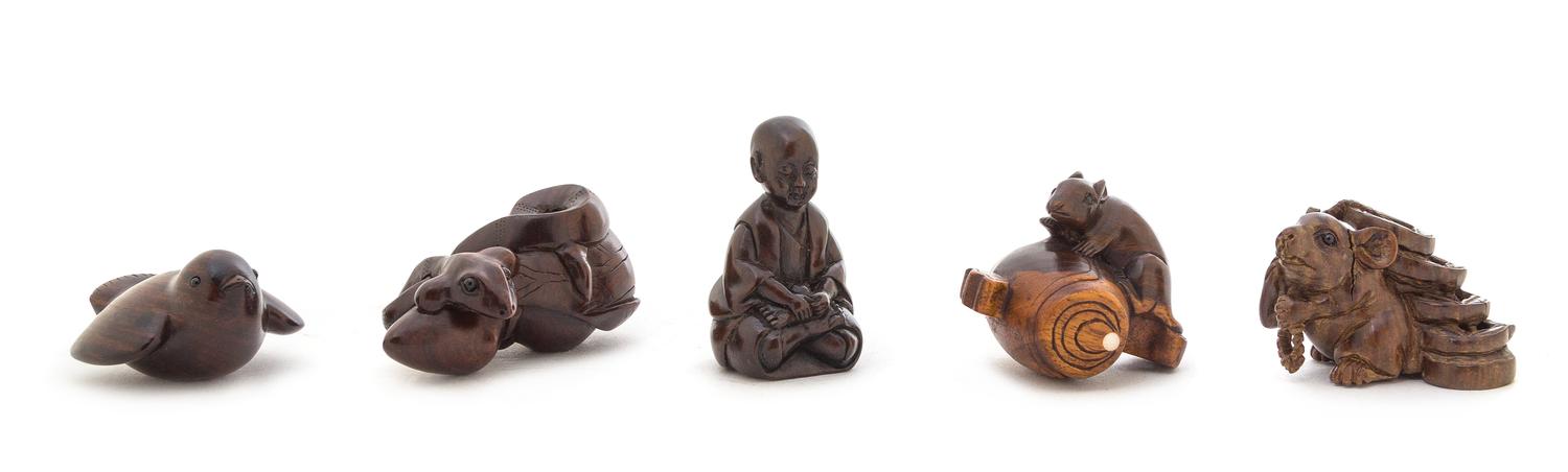 Five Carved Boxwood Netsukes Length of longest 2 3/8 inches.