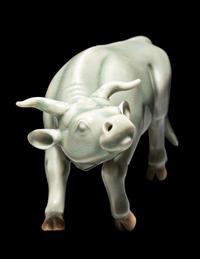 A Japanese Hirado Celadon Glazed Porcelain Water Buffalo-Form Water Dropper