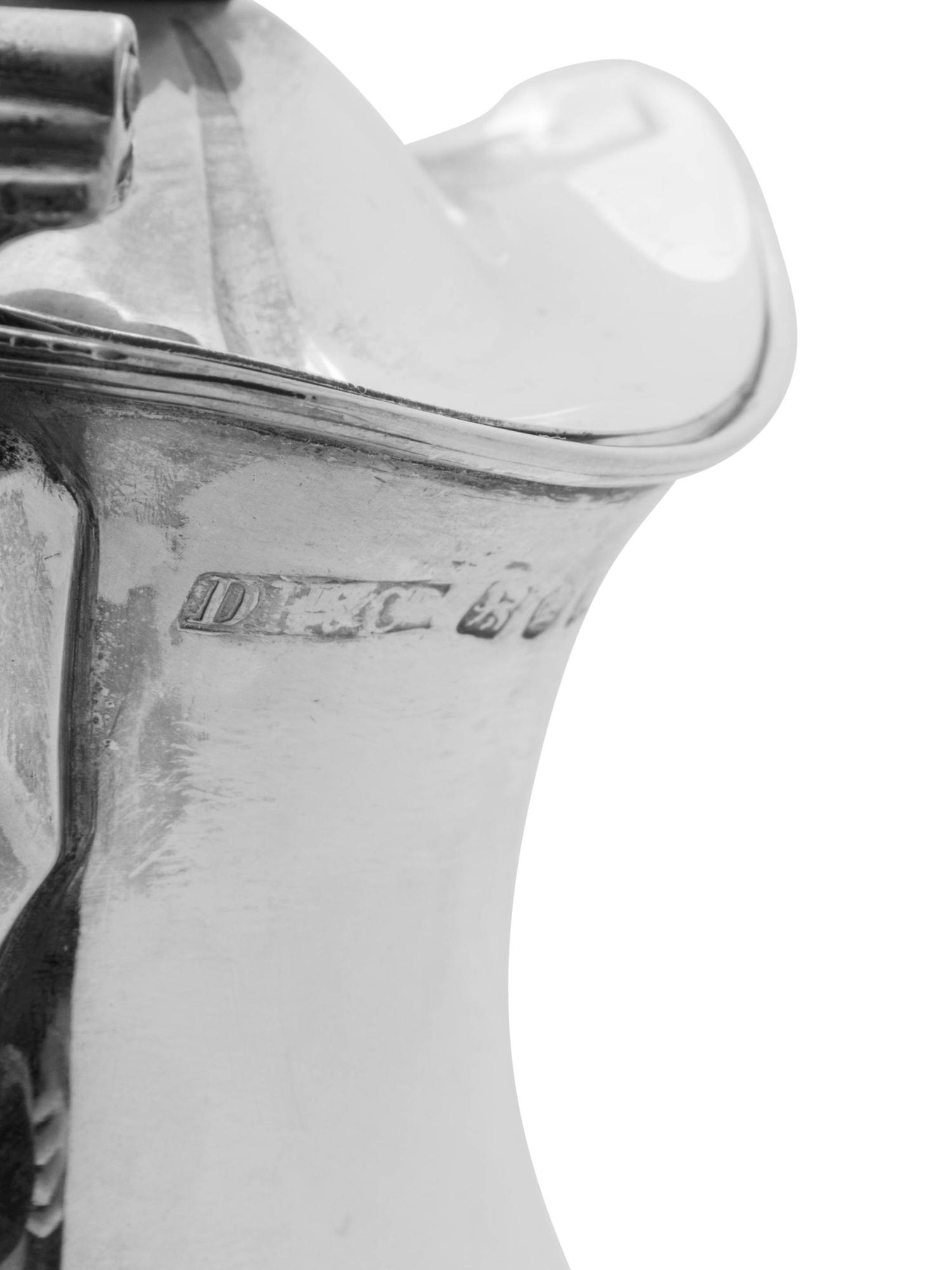A George III Silver Ewer