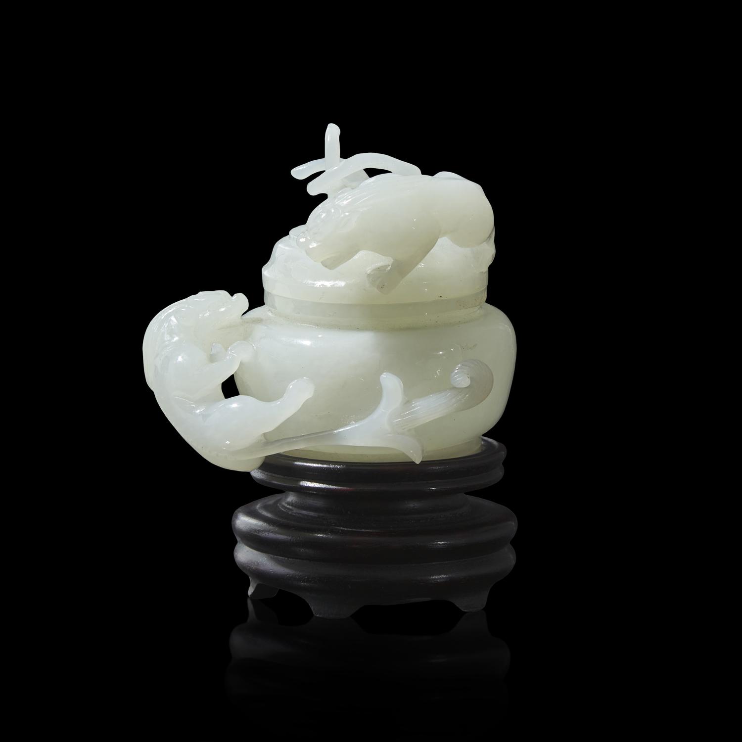 A Small Chinese Carved White Jade ' Qilong' Covered Jar 白玉螭龍蓋罐