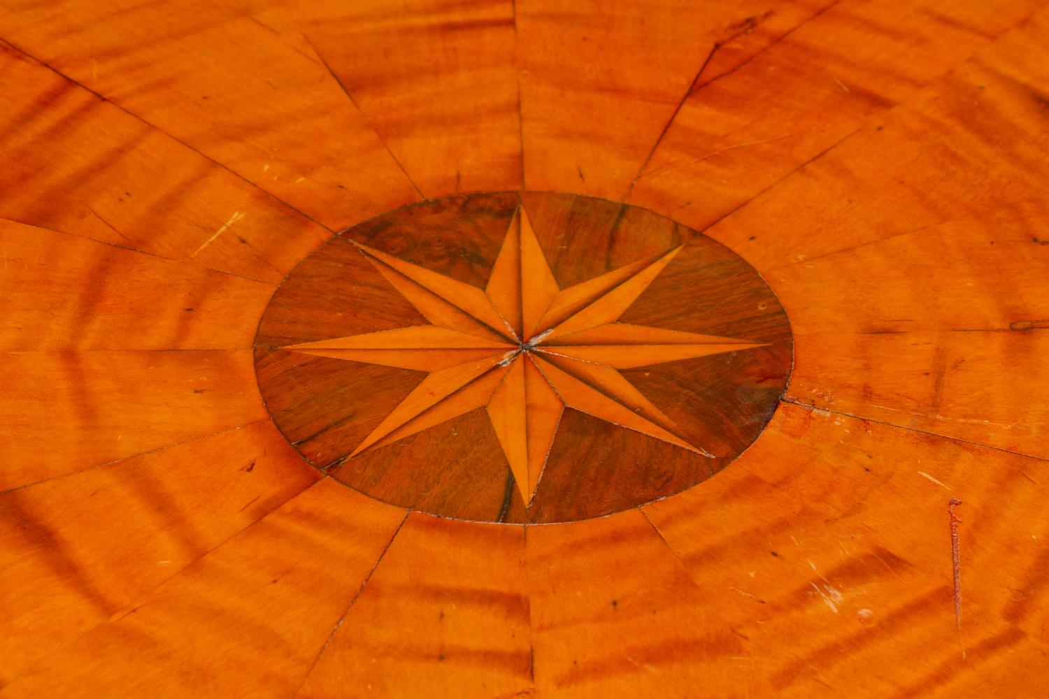 An Austrian Part Ebonized and Inlaid Ash and Walnut Center Table — 19TH CENTURY