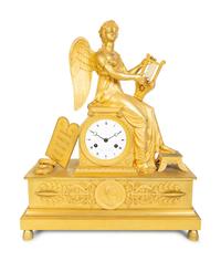 A French Empire Gilt Bronze Figural Clock — 19TH CENTURY
