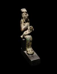 An Egyptian Bronze Isis with Baby Horus