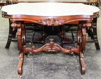 A Victorian Walnut Occasional Table Height 29 inches.