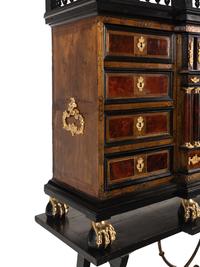 A Flemish Baroque Part Ebonized Walnut Cabinet on Later Stand