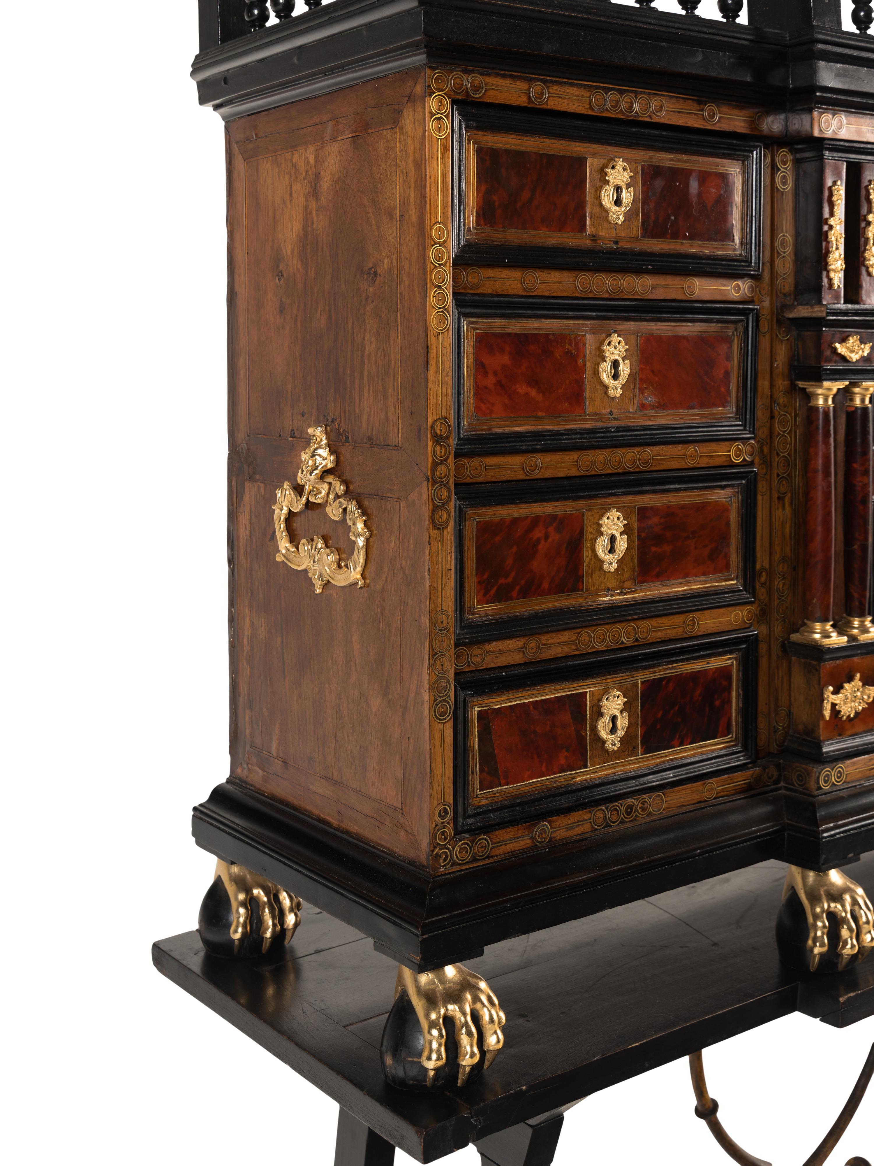 A Flemish Baroque Part Ebonized Walnut Cabinet on Later Stand