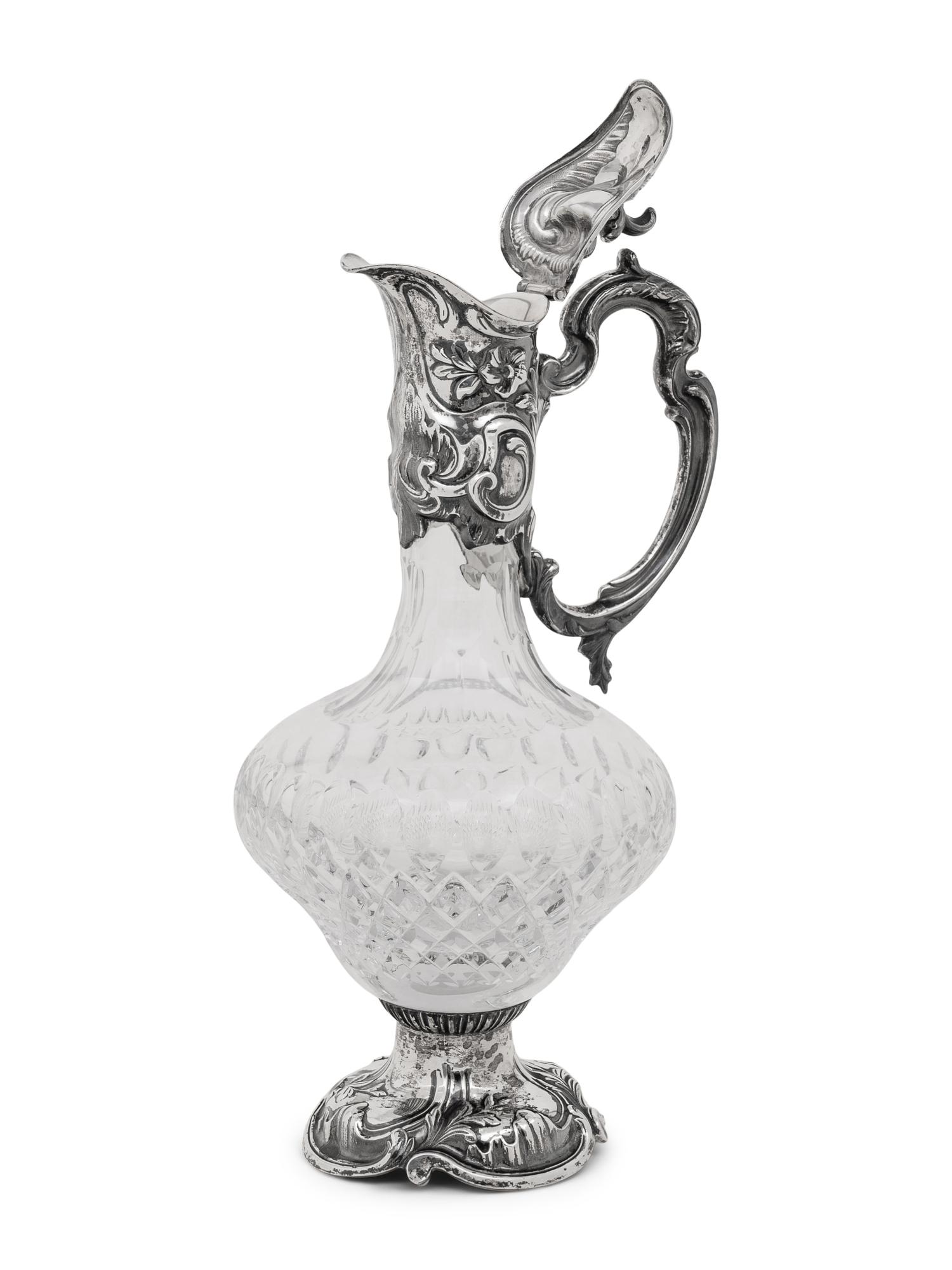 A Portuguese Silver Mounted Cut Glass Claret Jug
