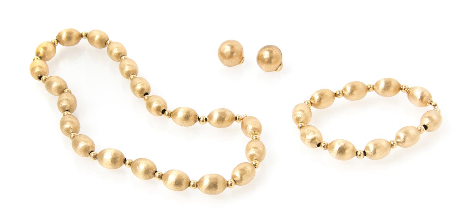 A Yellow Gold Demi Parure, 23.80 dwts.